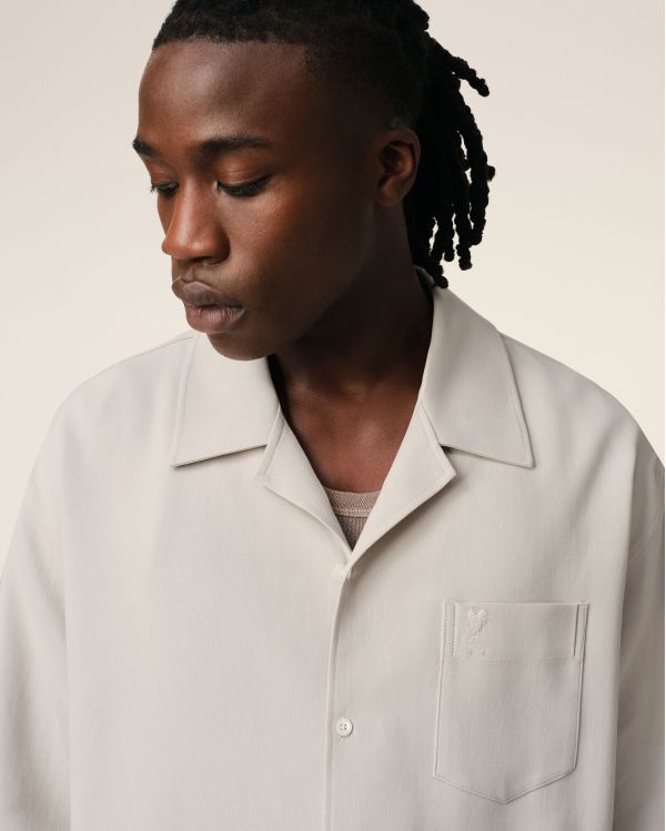 BEIGE SHORT-SLEEVED SHIRT WITH SHARK COLLAR