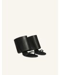 MULES COMPENSEES OBLIQUES EN CUIR NOIR