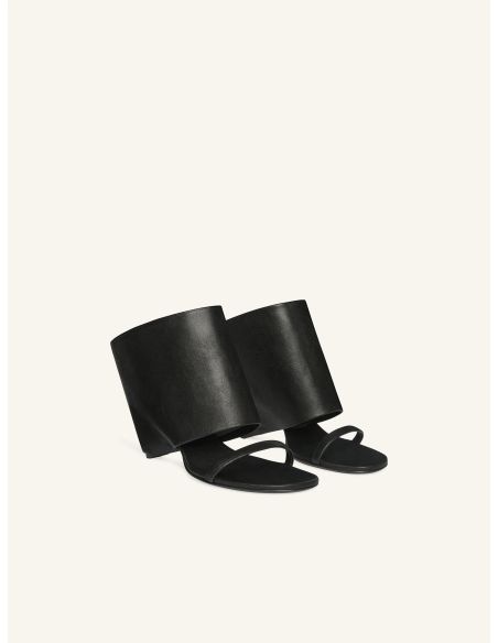 MULES COMPENSEES OBLIQUES EN CUIR NOIR