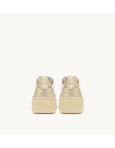 MEDALIST PLATFORM SNEAKERS IN WHITE AND PLATINUM