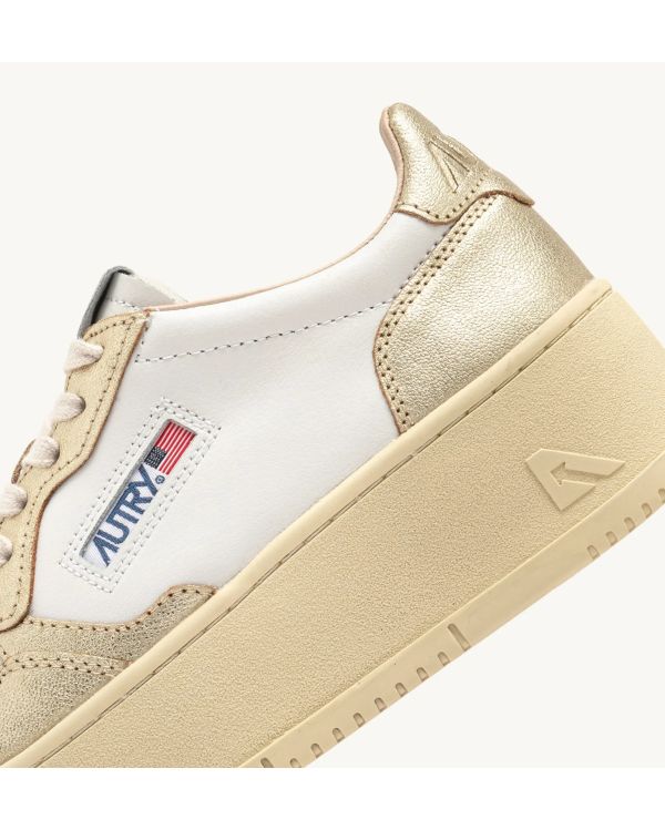 MEDALIST PLATFORM SNEAKERS IN WHITE AND PLATINUM