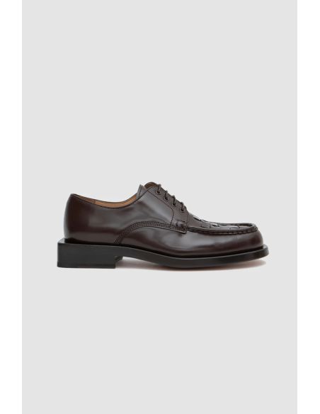 BROWN BRAIDED DERBYS