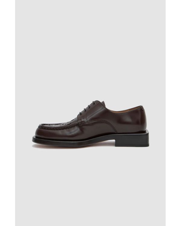 BROWN BRAIDED DERBYS