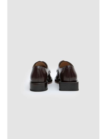 BROWN BRAIDED DERBYS
