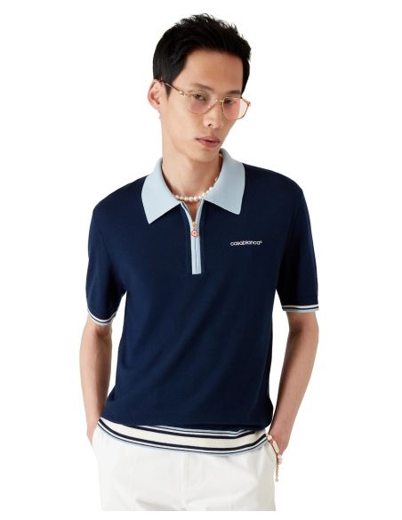 POLO DE TENNIS EN TRICOT MÉRINOS MARINE