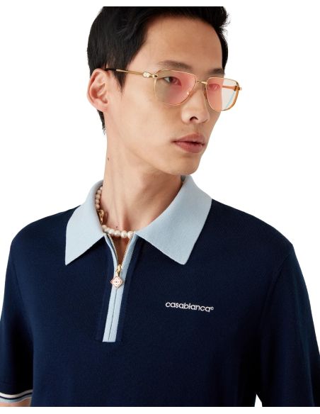POLO DE TENNIS EN TRICOT MÉRINOS MARINE