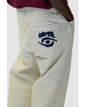 BACK POCKET GRAPHIC PANTS CREAM