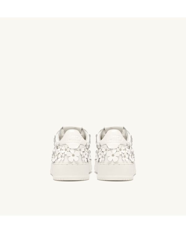 MEDALIST LOW WOM PATENT/FLOWER WHITE