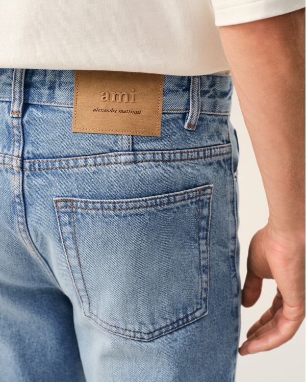 JEAN COUPE TAPERED EN COTON BLEU USÉ