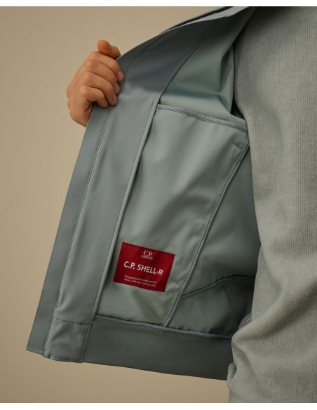 VESTE A CAPUCHE C.P SHELL-R BLEU ARGENTE