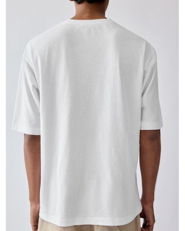 LE TSHIRT PLAGE ÉCUSSON BEIGE TRICOT BLANC